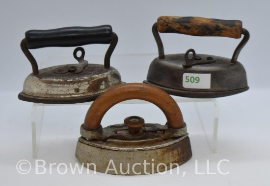 (3) Small sad irons w/wooden handles