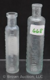 (2) medicine bottles