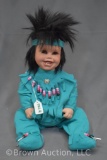 Porcelain Native American Indian happy girl doll, 21