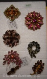 (7) Brooches, most colored rhinestones