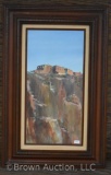 Acrylic painting of adobe houses on cliff, artist signed by can't make out