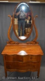 Oak 3-drawer dresser w/swing beveled oval mirror, serpentine drawers