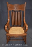 Antique Oak armed rocking chair w/cane seat, man's size