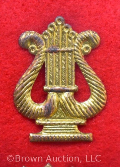 Stamped Brass Musician's lyre insignia