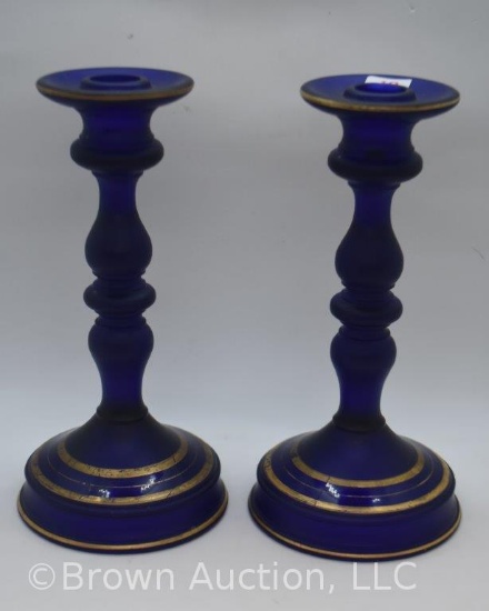 Pair Tiffin cobalt satin glass 8.5"h candlesticks with gold trim