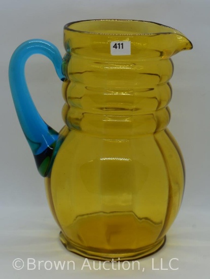Art Glass amber 9" pitcher with applied blue handle