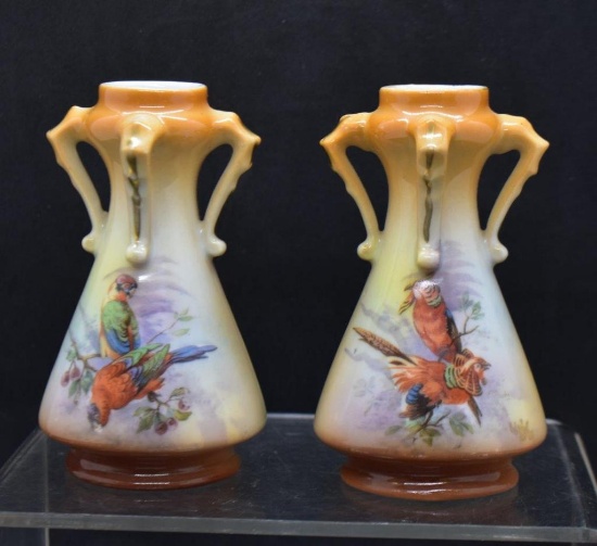 Pair of handpainted 3.5"h cabinet vases decorated with colorful parrots