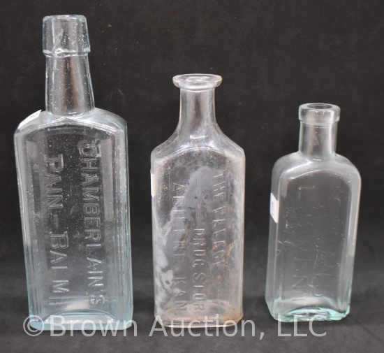 (3) Embossed glass medicine bottles, 1880-1890's: Palace Drug Store, Abilene, KS; Chamberlain's Pain