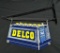 RARE SIZE 2 SIDED DIE CUT TIN SIGN DELCO BATTERIES