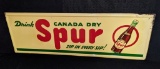 EMBOSSED TIN SIGN DRINK CANADA DRY SPUR