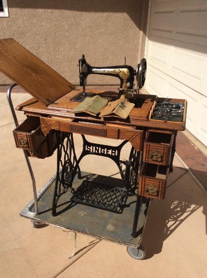 1900s Vintage Singer No 27-4 treadle sewing machine with manuals & attachments