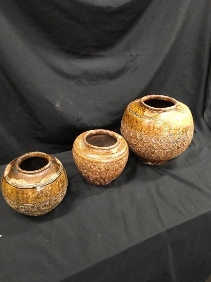 Pottery set.  2 are 8" tall 1 is 12"tall