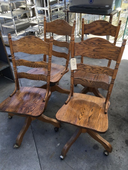 Wood swivel chairs on casters