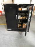 Devon storage cabinet with contents, plumbing components