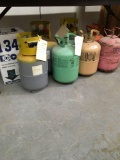 Freon, 7 partial canisters and 1 new 134A