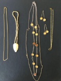 Womens necklaces and a pair of earrings, costume jewelry