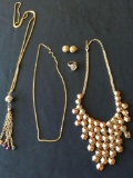 Womens necklaces, a pair of earrings and a ring, costume jewelry
