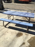 Picnic table with plastic seats and top, 6 ft. wide