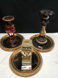 Candle stands, 7 in. to 12 in. tall, on 10 in. mirrored trays