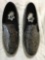 New Starry Eyed black faux skin sneakers with illuminating sole. Size 9 men, 11 women, 17 pair