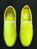 New Starry Eyed neon yellow canvas sneakers with illuminating sole. Size 9 men, 11 women, 12 pair