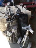 Golf clubs with bags and 1 bag caddy