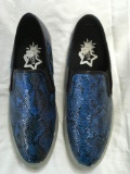 New Starry Eyed aqua faux skin sneakers with illuminating sole. Size 7 men, 9 women, 12 pair