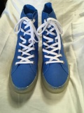 New Starry Eyed blue canvas sneakers with illuminating sole. Size 11 men, 12 pair