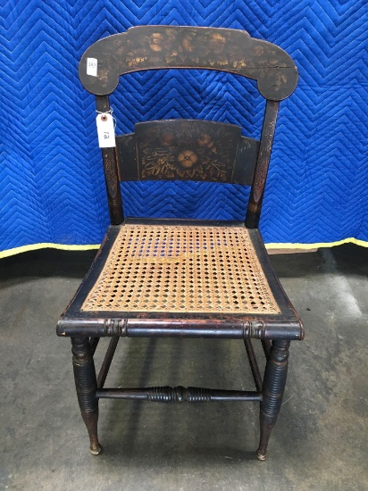 Antique chair with wicker seat