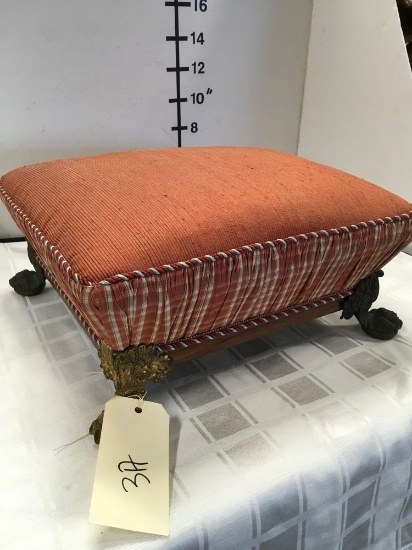 Vintage foot stool with metal claw feet