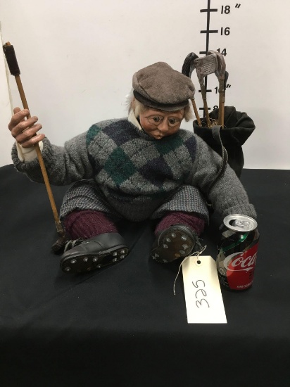 Vintage gentleman golfer with golf bag and clubs doll.