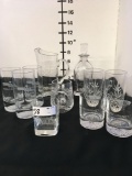 Crystal decanter, water pitcher and assorted glasses, all etched with various Logos, 11 pieces