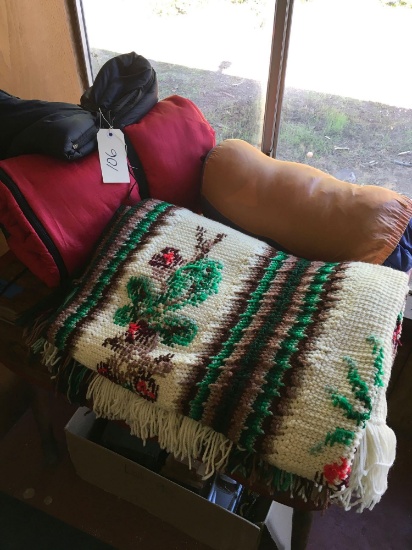 Lot of camping items and blanket