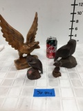 Assorted wood carved figurines(4 pieces)