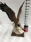 G Armani eagle statue