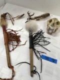 1) Animal head skeleton, 2) Native American Dance sticks.