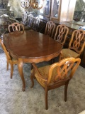 Vintage Dining table and 6 chairs with leaf stored under table