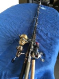 4) fishing poles and reels. See pics for reel info