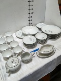 39 piece Harmony Rose dinner set and Royal Castle gravy dish. See pic for stamps