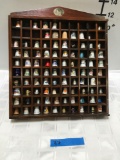 90 assorted collectible thimbles and display case