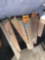 Assorted size hand saws and machete