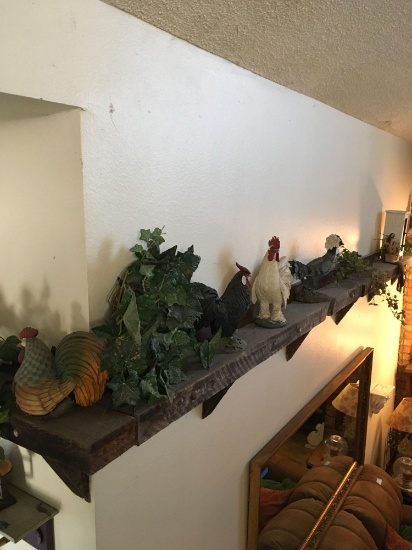 Items on shelf. Decorative roosters, artificial plants, etc