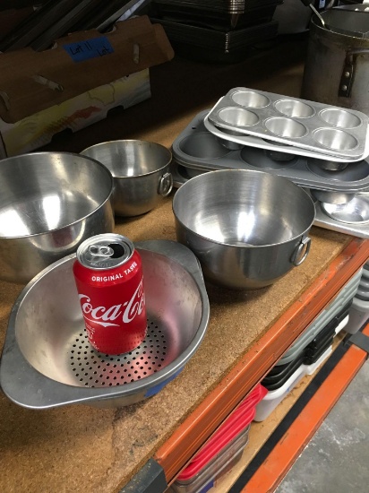 Muffin pans, stainless steel bowls, pizza rounds