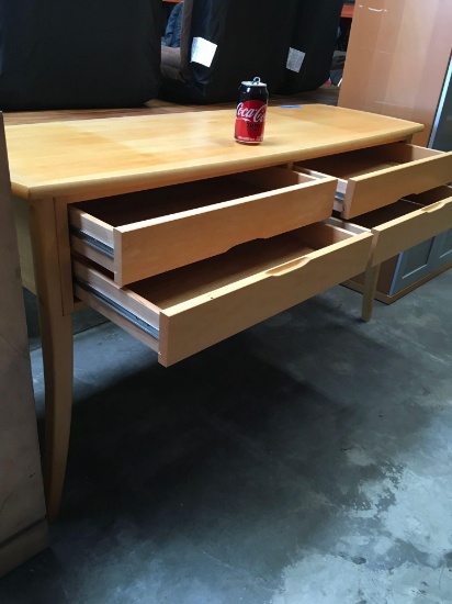 28 1/2" x 53" x 17" four drawer table