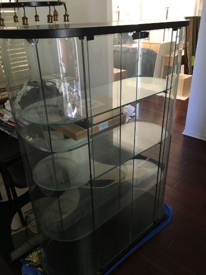 63" x 48" x 21", 3 tier, glass, locking cabinet. Lights up see pics