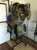 Rolling Grid display rack with assorted tactical gear ( vests, helmets, belts, etc)