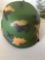 New. Plastic camo helmets. 12 pieces