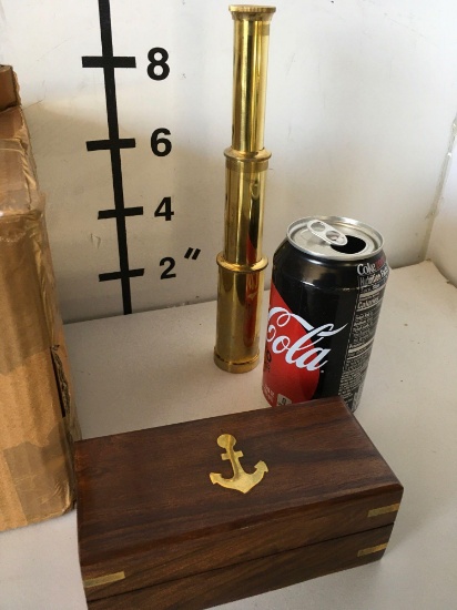 New nautical. 9" brass finish, telescope with wooden box.. Each box contains 12 pieces ( office use