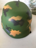 New. Plastic camo helmet. 12 pieces