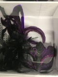 New black/ purple with glitter feathered masks. Individually boxed